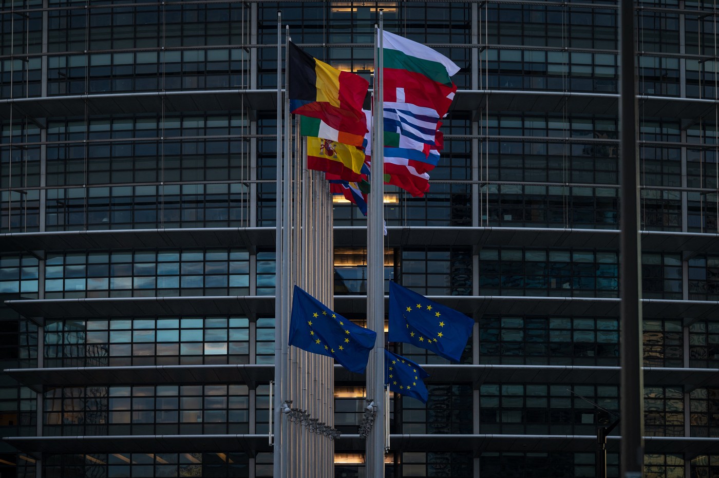 EU flags fly at half-mast outside the European Parliament