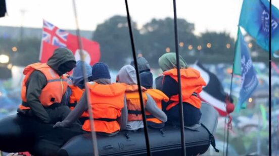 The Banksy inflatable migrant boat artwork was released during Idles’ Glastonbury set