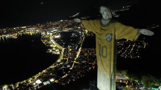 Aerial view showing an image projected onto the Christ the Redeemer statue pays tribute to Brazilian football legend Pele on the first anniversary of his death