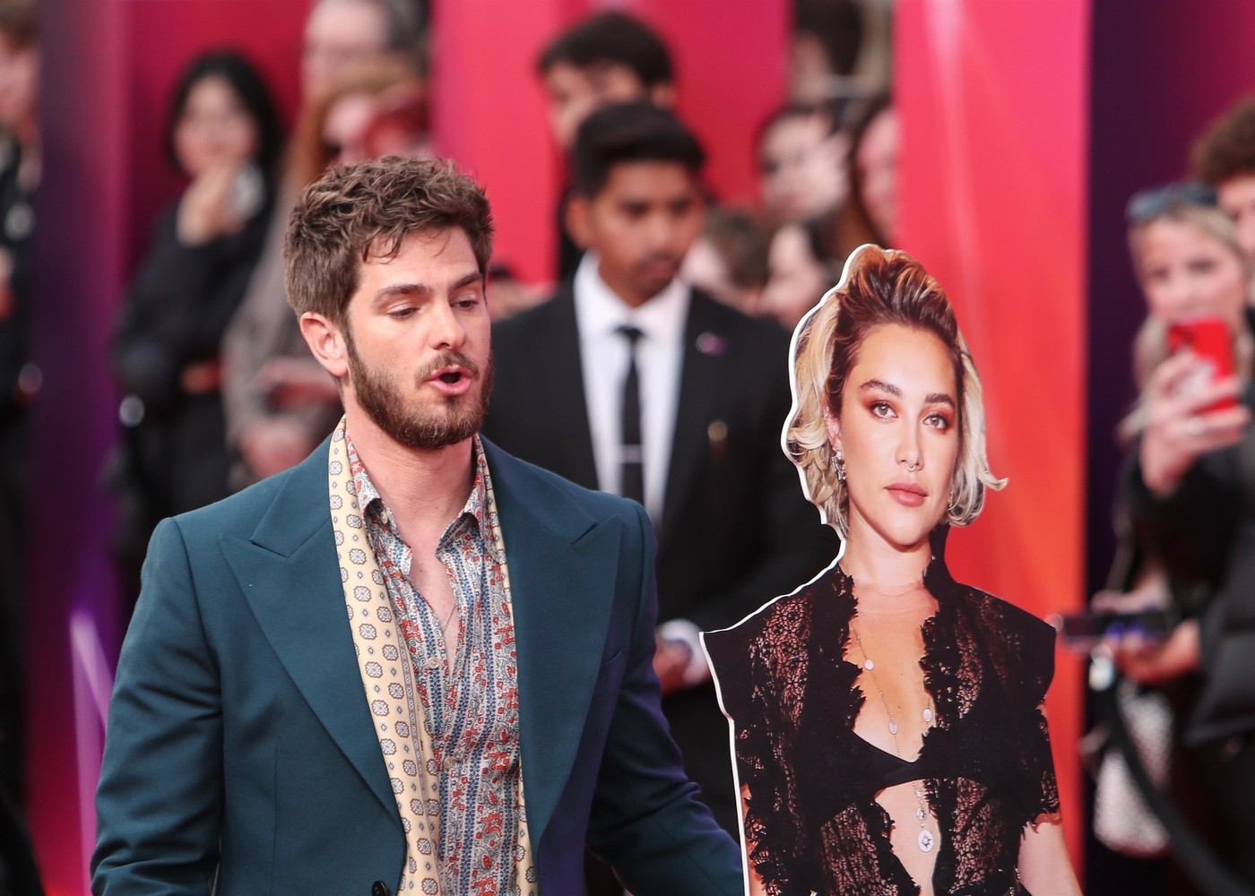 Andrew Garfield, alongside a Florence Pugh cardboard cutout